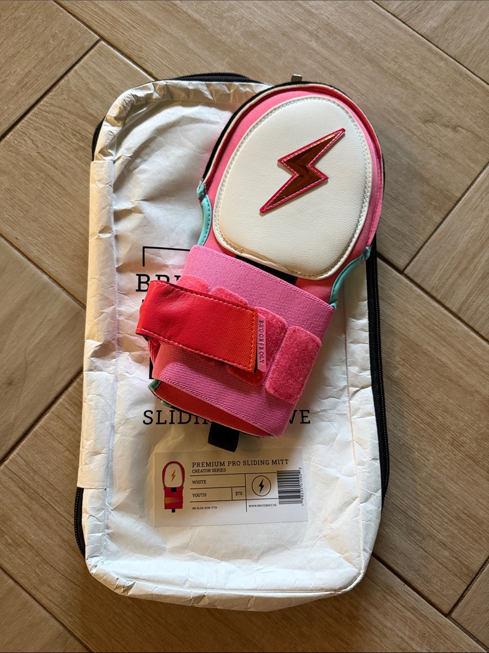 Bruce Bolt Youth Sliding Mitt in Pink & White with Lightning Accent